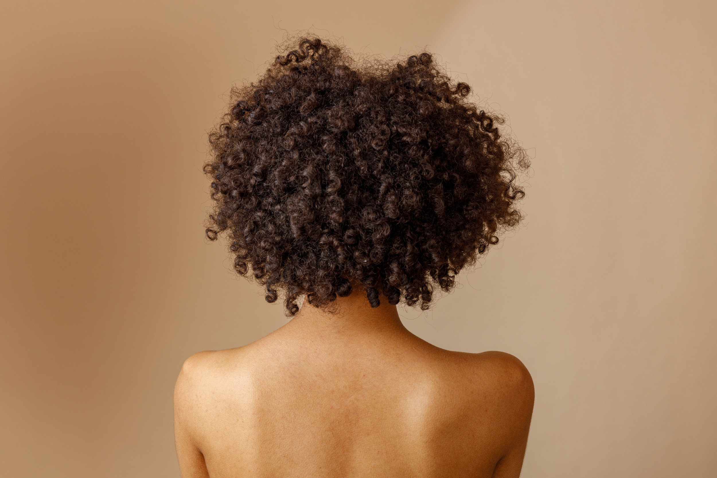Curly Hair May Have Been Key to Human Brains Growing So Big