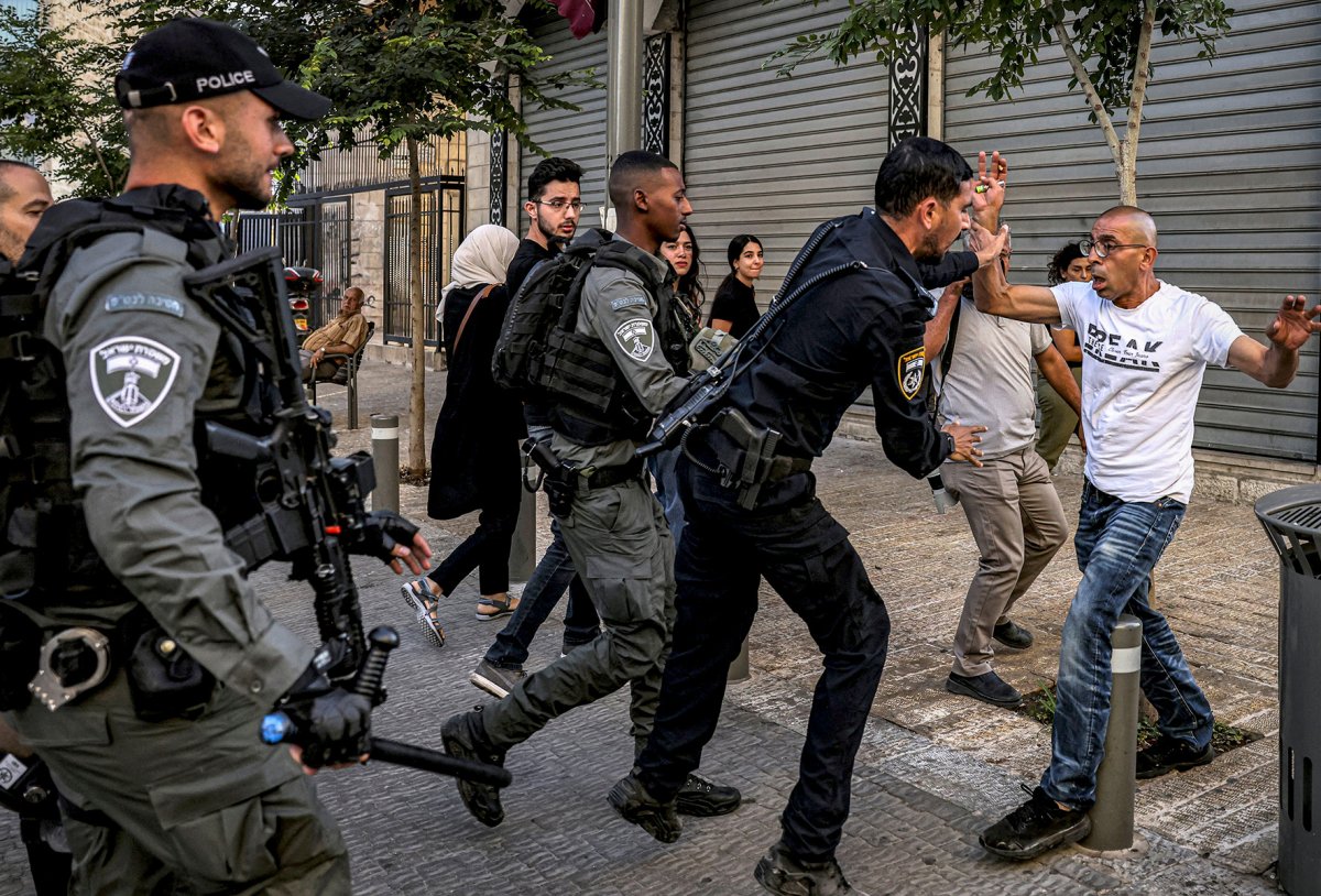 Israeli Policeman and a Palestinian Scuffle