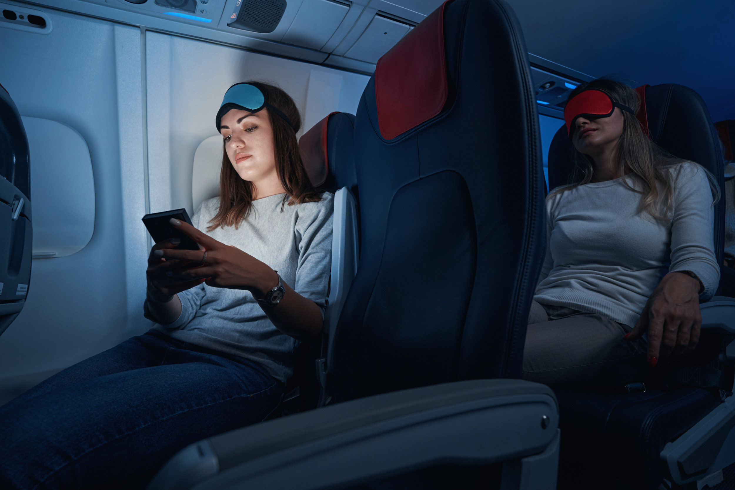 Man Sleeping on Plane Floor So Girlfriend Gets Entire Row Sparks