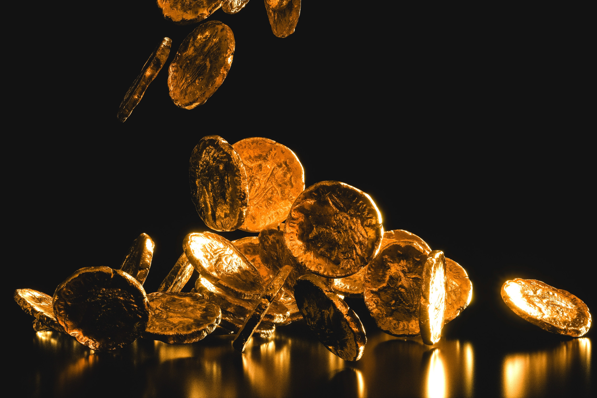 Ancient gold coins falling