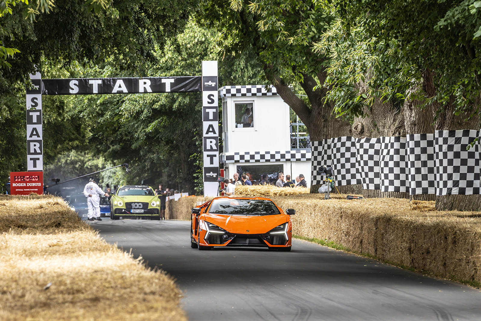 Hot Cars, Soggy Weather On Display At Goodwood Festival Of Speed - Newsweek