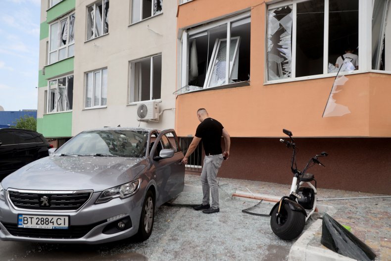 Man inspects damage after Odesa air strikes
