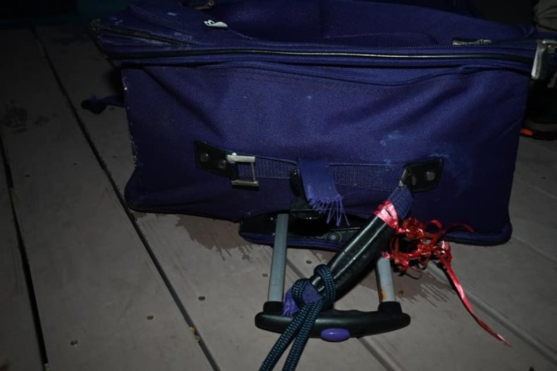 Purple Ricardo Beverly Hills bag.