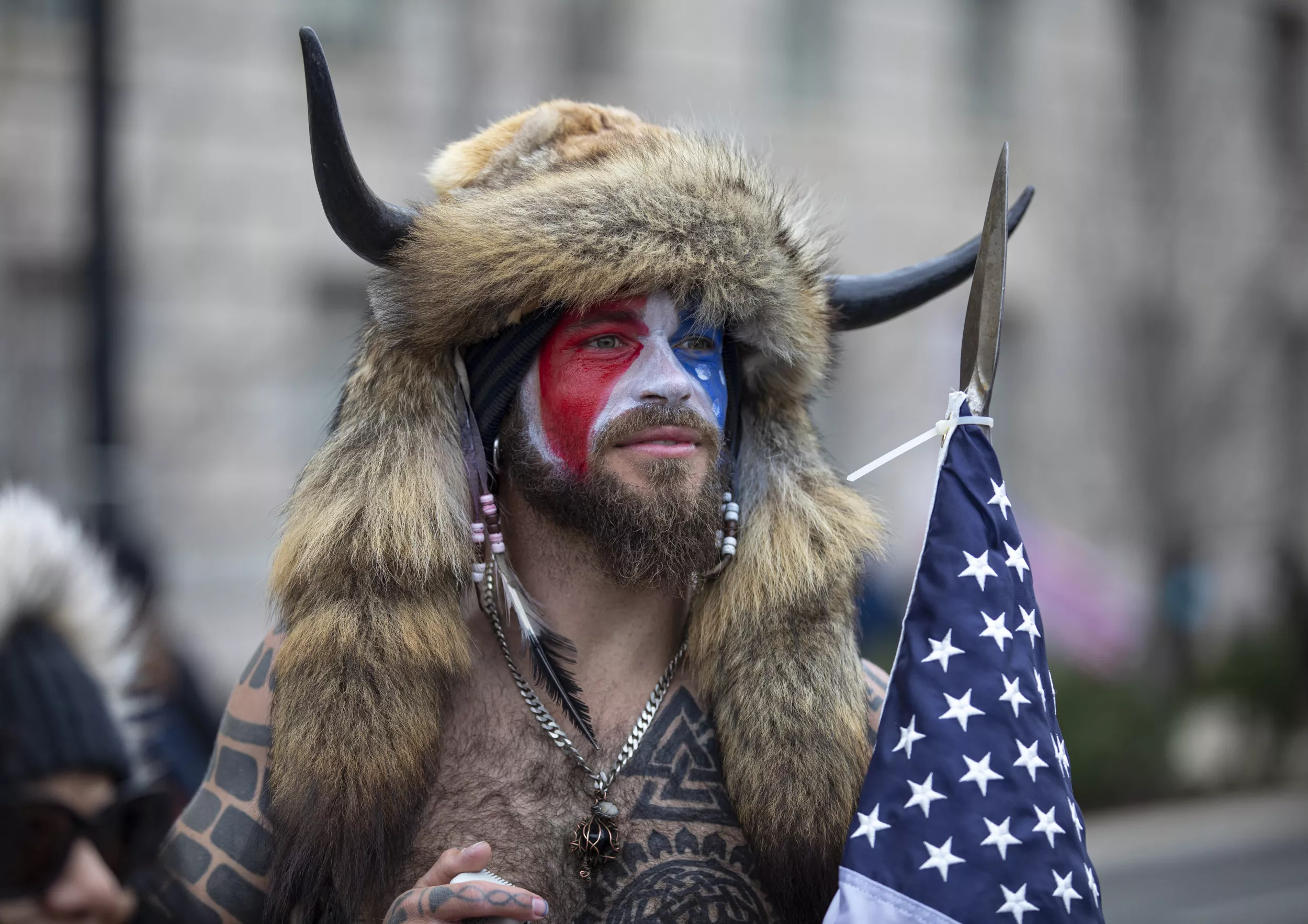 'QAnon Shaman' Rubbishes Claims Tucker Carlson Got Him Released - Vimarsana News
