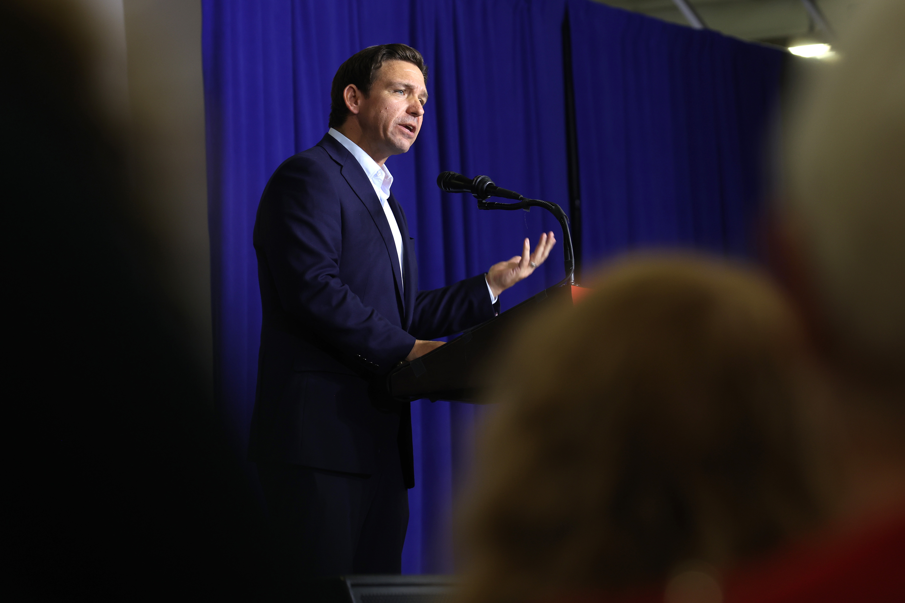 DeSantis Confronted With Trump Signs at Iowa Rally