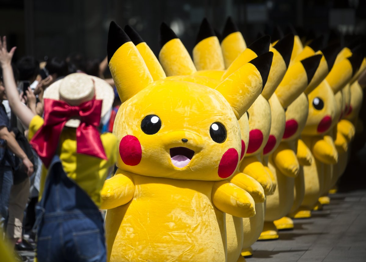 Multiple Pikachu mascots pictured together