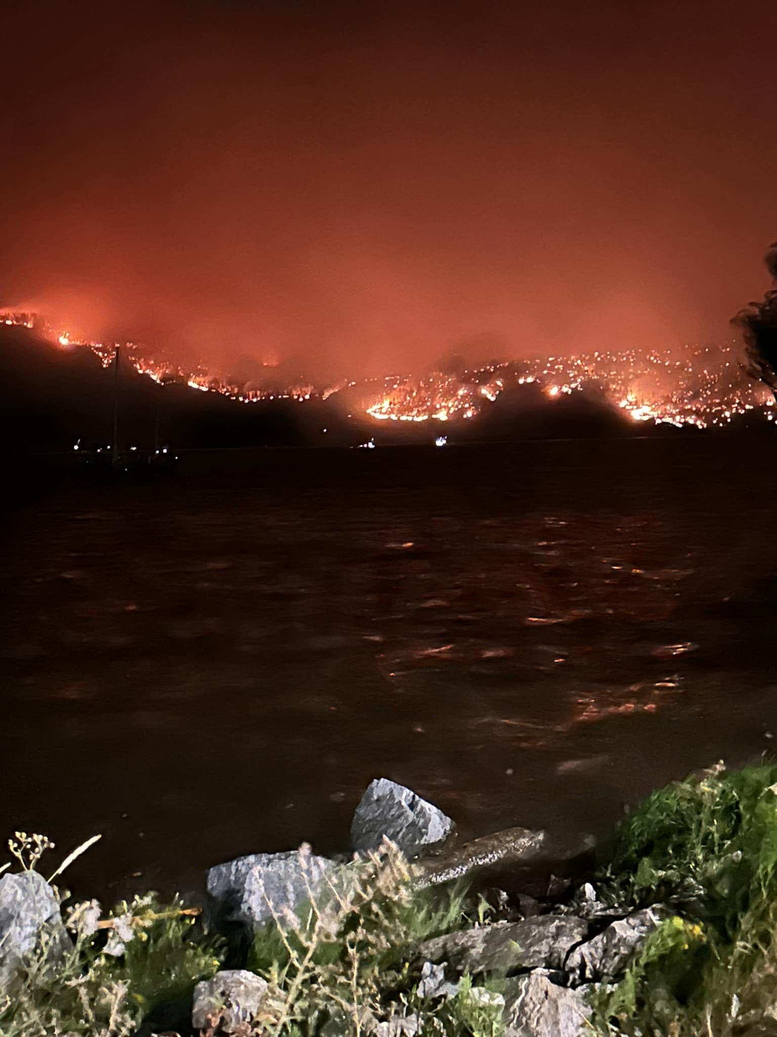 Plea for Boats to Rescue Individuals in Water Amid Fires in Canada