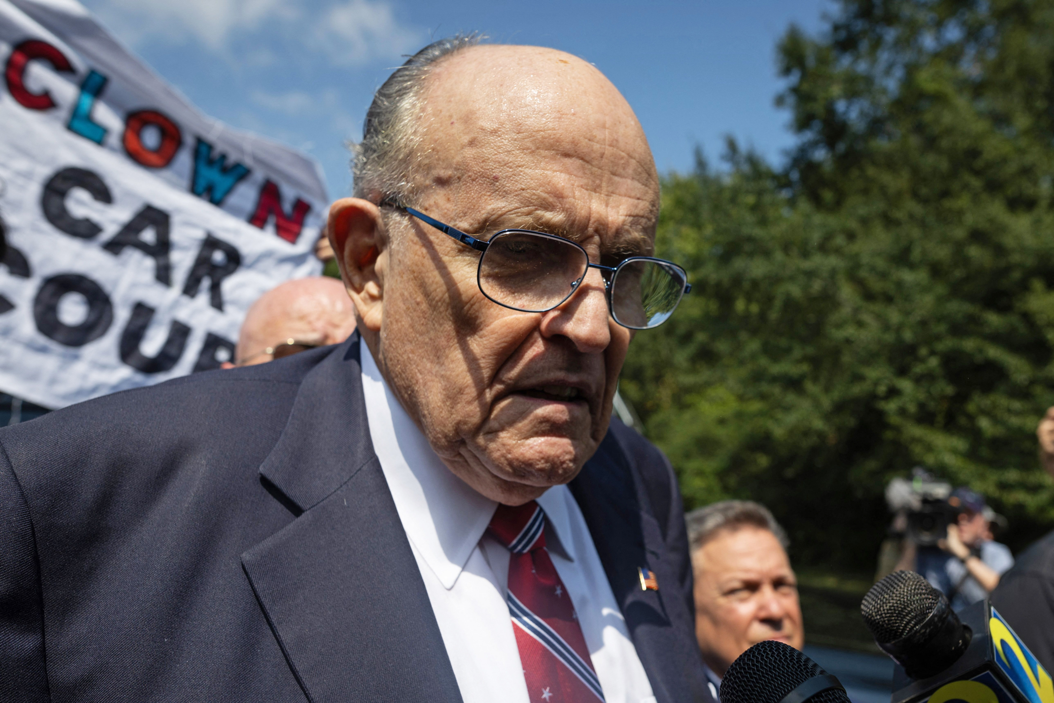 Rudy Giuliani Mugshot Released As Trump Ally Embraces Arrest