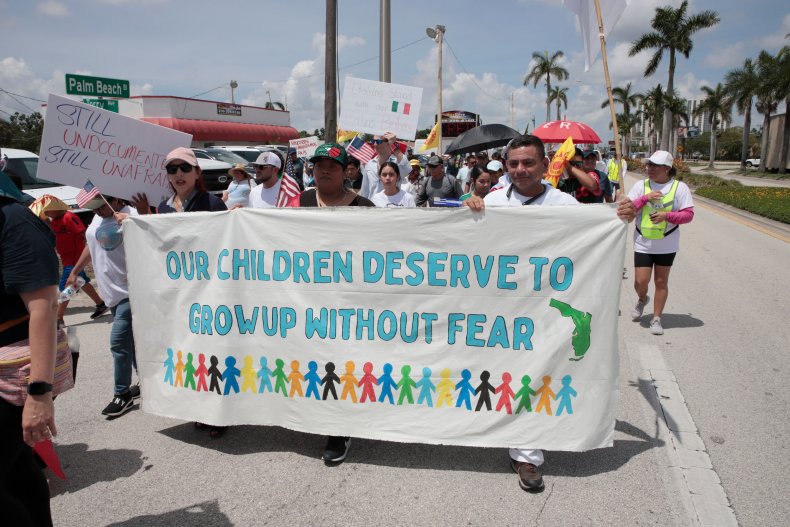 Protesters against a new immigration law march