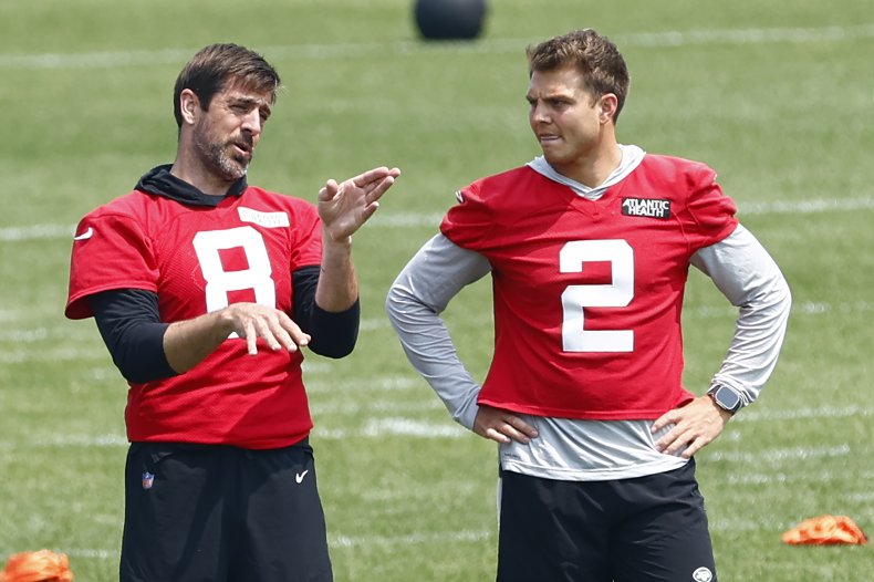Aaron Rodgers and Zach Wilson