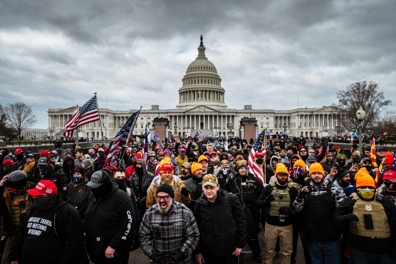 Pro-Trump protesters gather in front of the Capitol