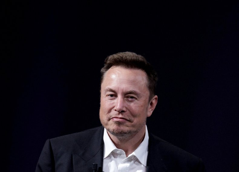 Elon Musk pulls a face in Paris