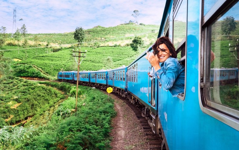 Woman smiling during train ride