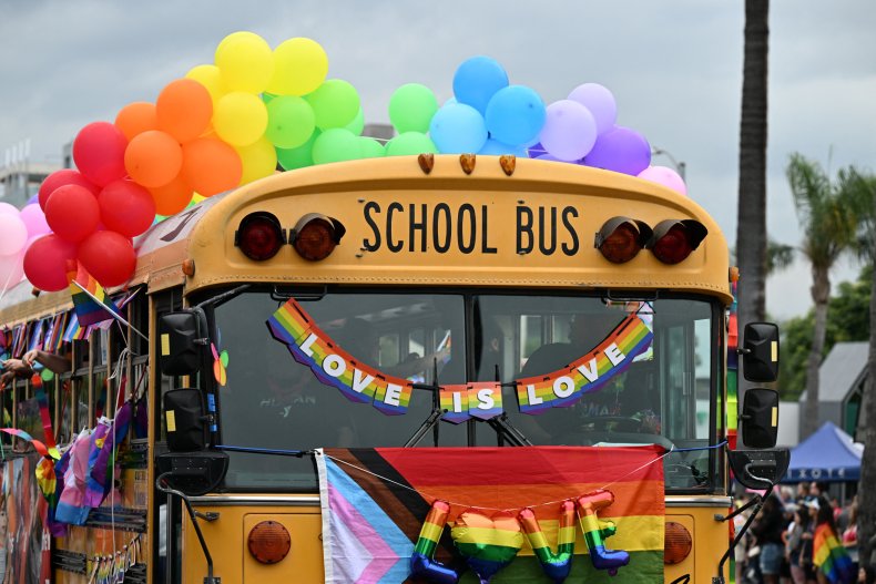 A school bus adorned with rainbow colors