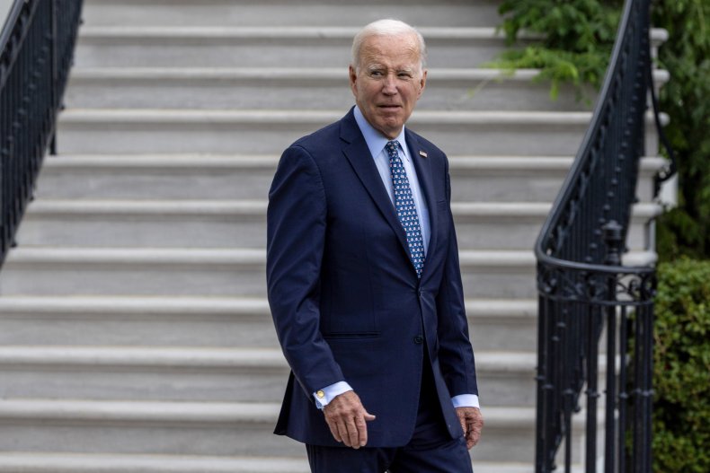 US President Joe Biden exits