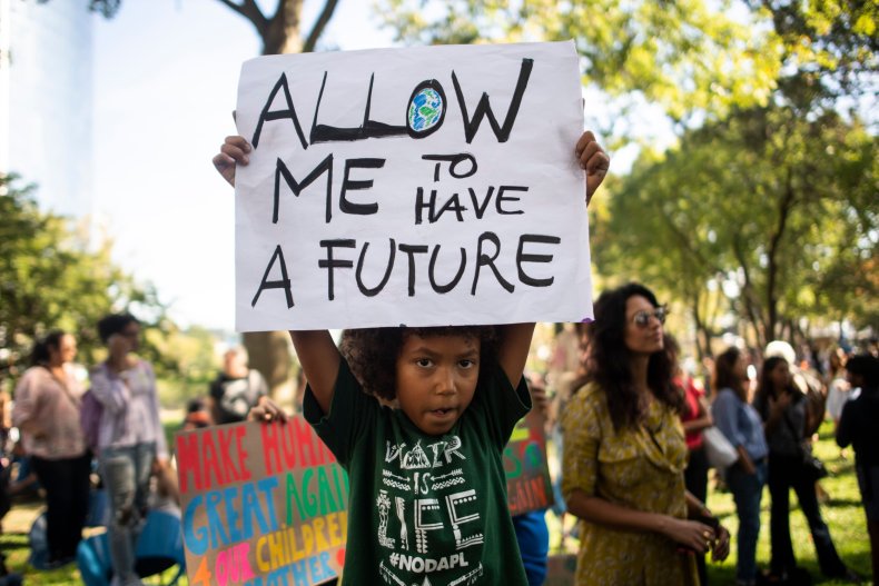 Boy at NYC climate protest