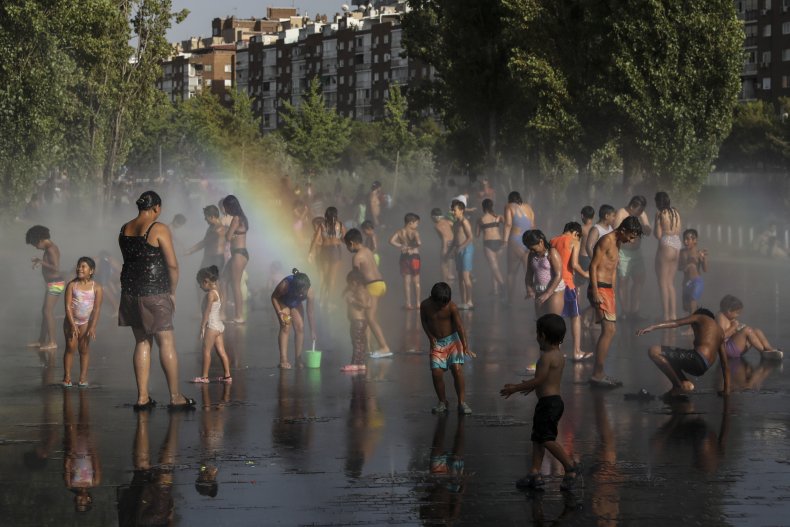 Kids playing in fountains