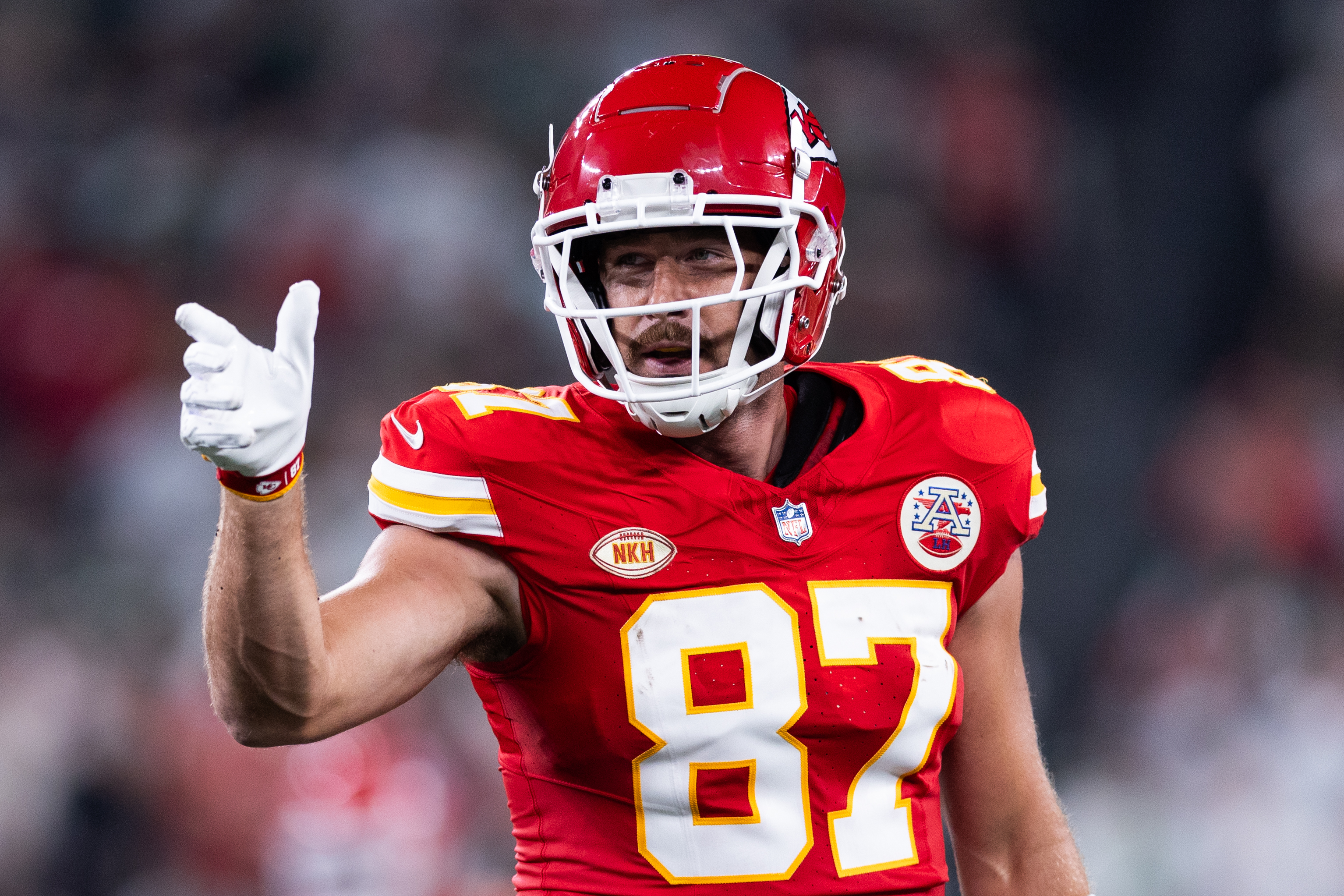 Travis Kelce reacts to proof he plays better with Taylor Swift at