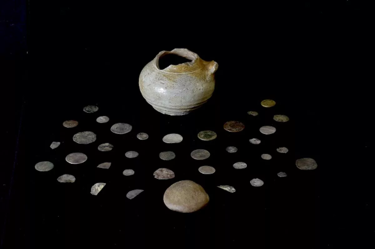 Coins Linked to Infamous Massacre Found Hidden in Fireplace - Vimarsana News