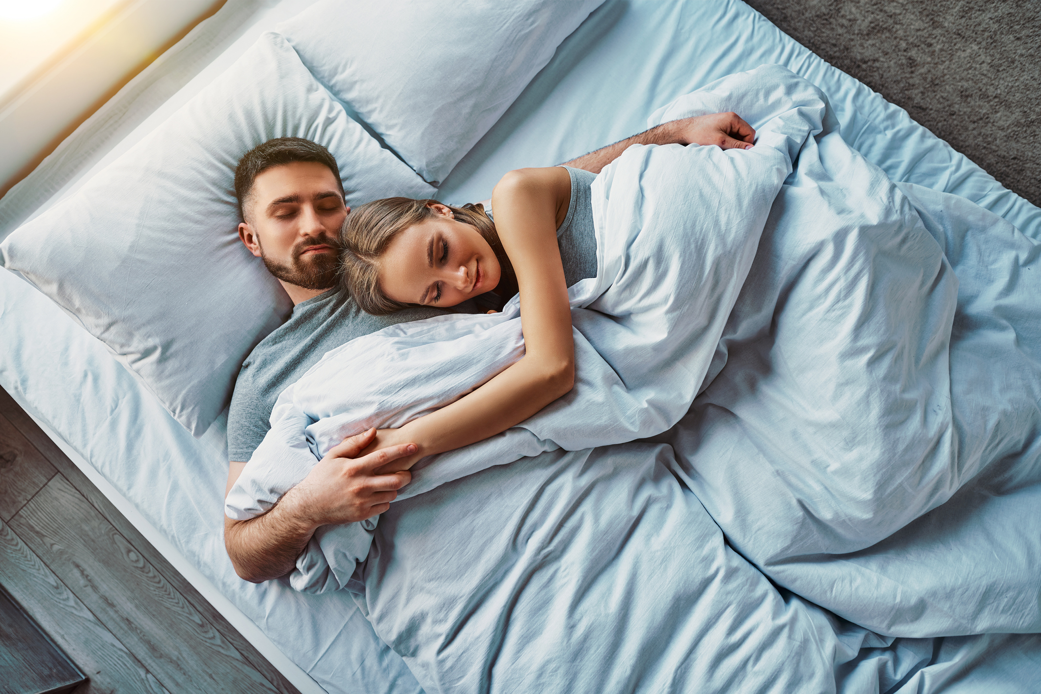 Should You Share a Bed With Your Partner? Sleep Scientists Break