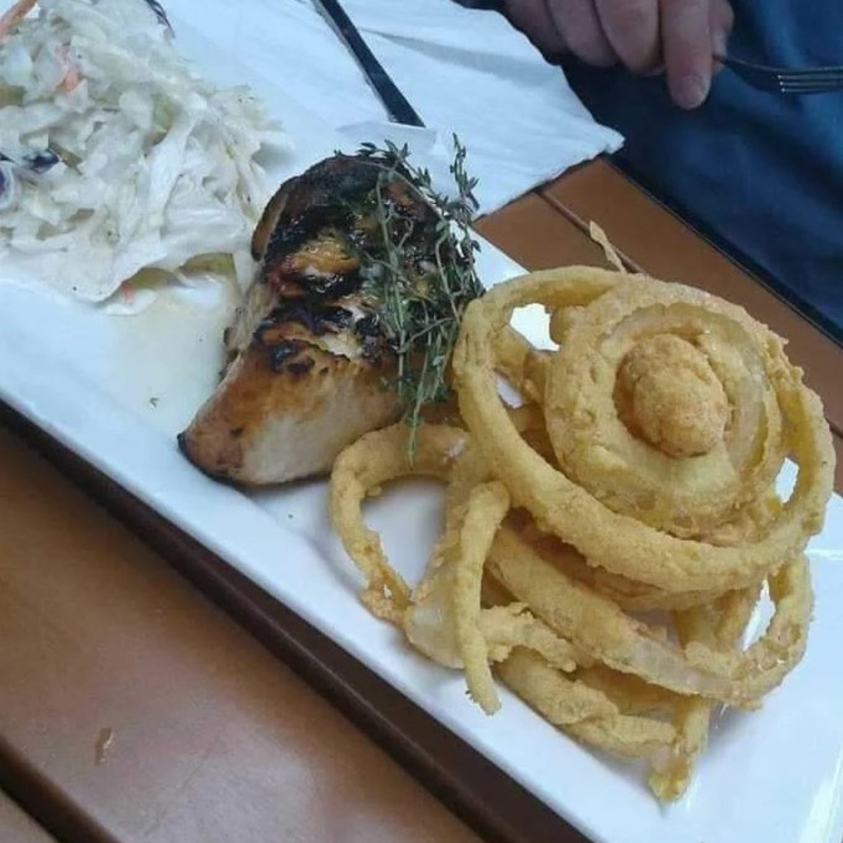 Some chicken steak and onion rings.