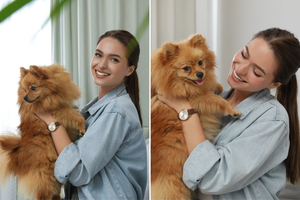 Woman holds onto pomeranian