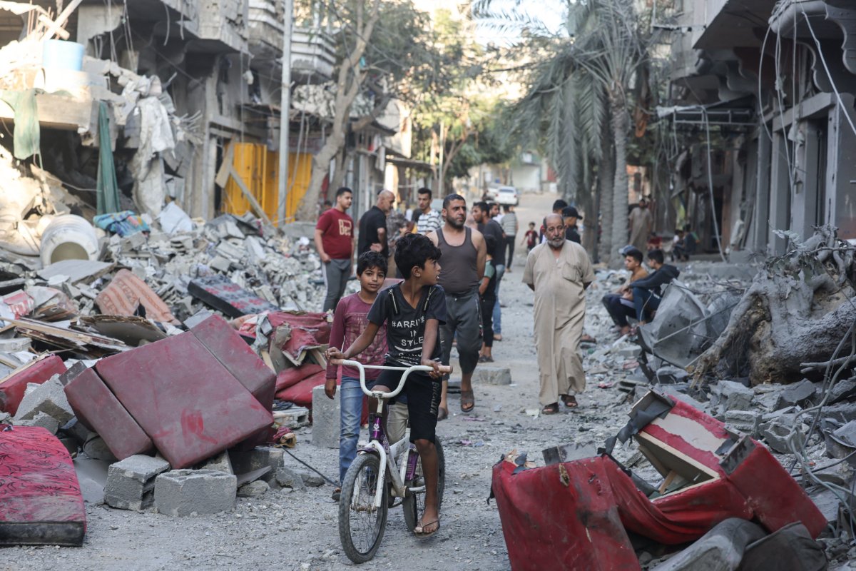 Palestinian, boys, walk, through, rubble, in, Gaza
