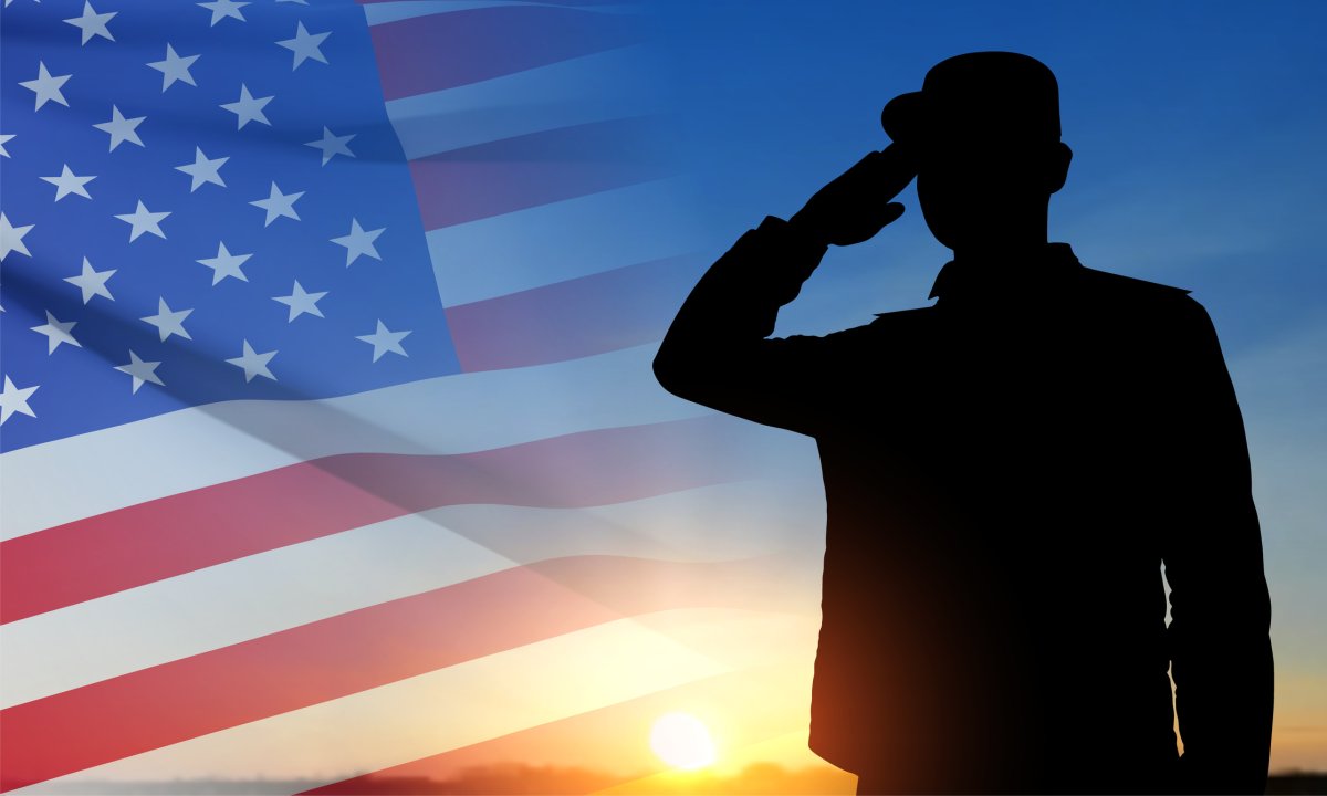 soldier silhouette American flag sunset