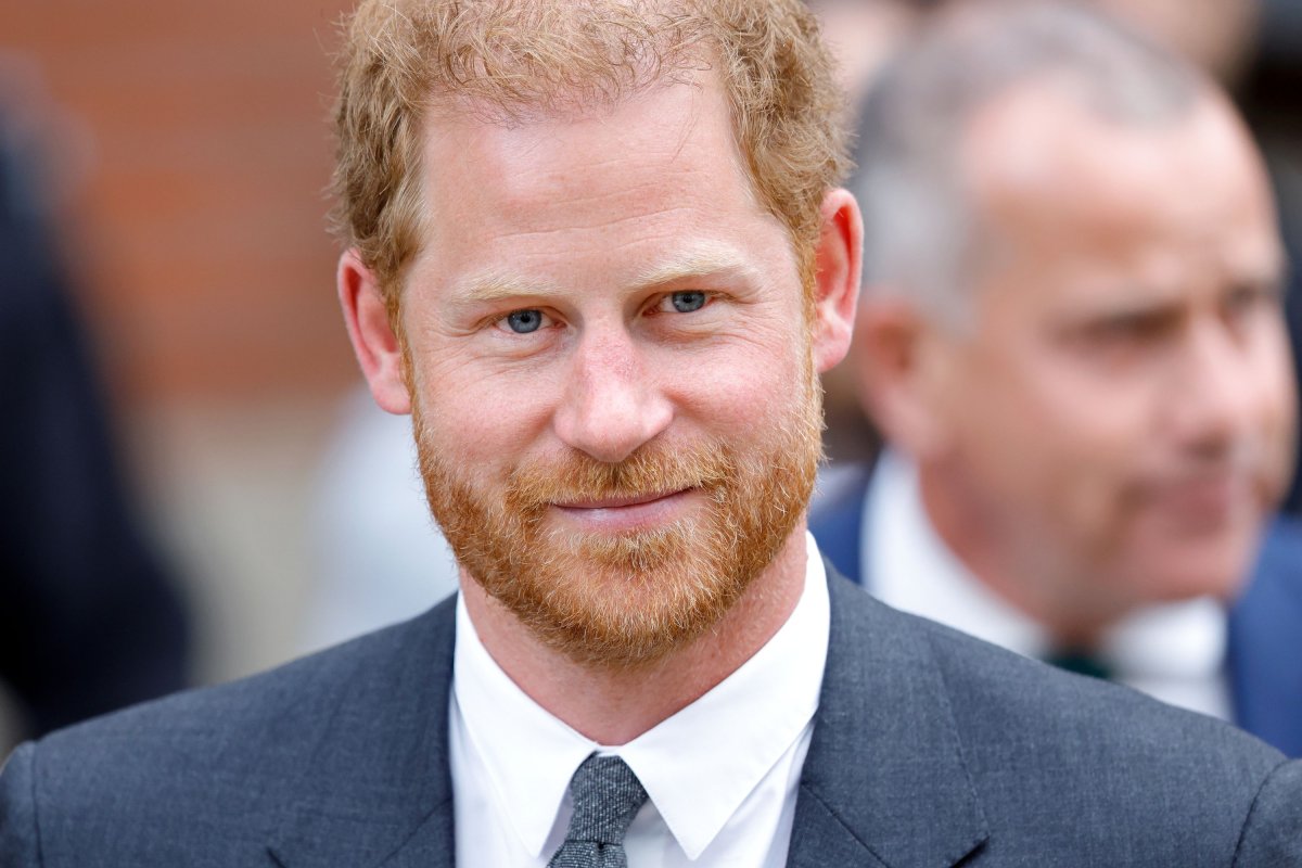 Prince Harry Smiles at Daily Mail Lawsuit