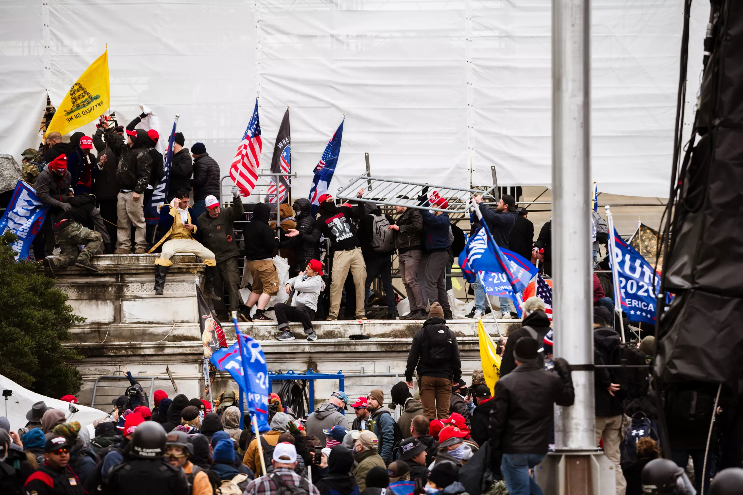 Jan. 6 Video of Capitol Rioter Fist-Bumping Police Raises Questions - Vimarsana News