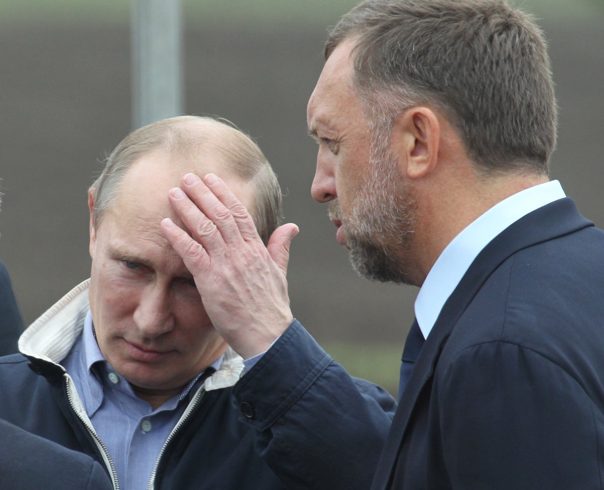 Russian President Vladimir Putin and Oleg Deripaska