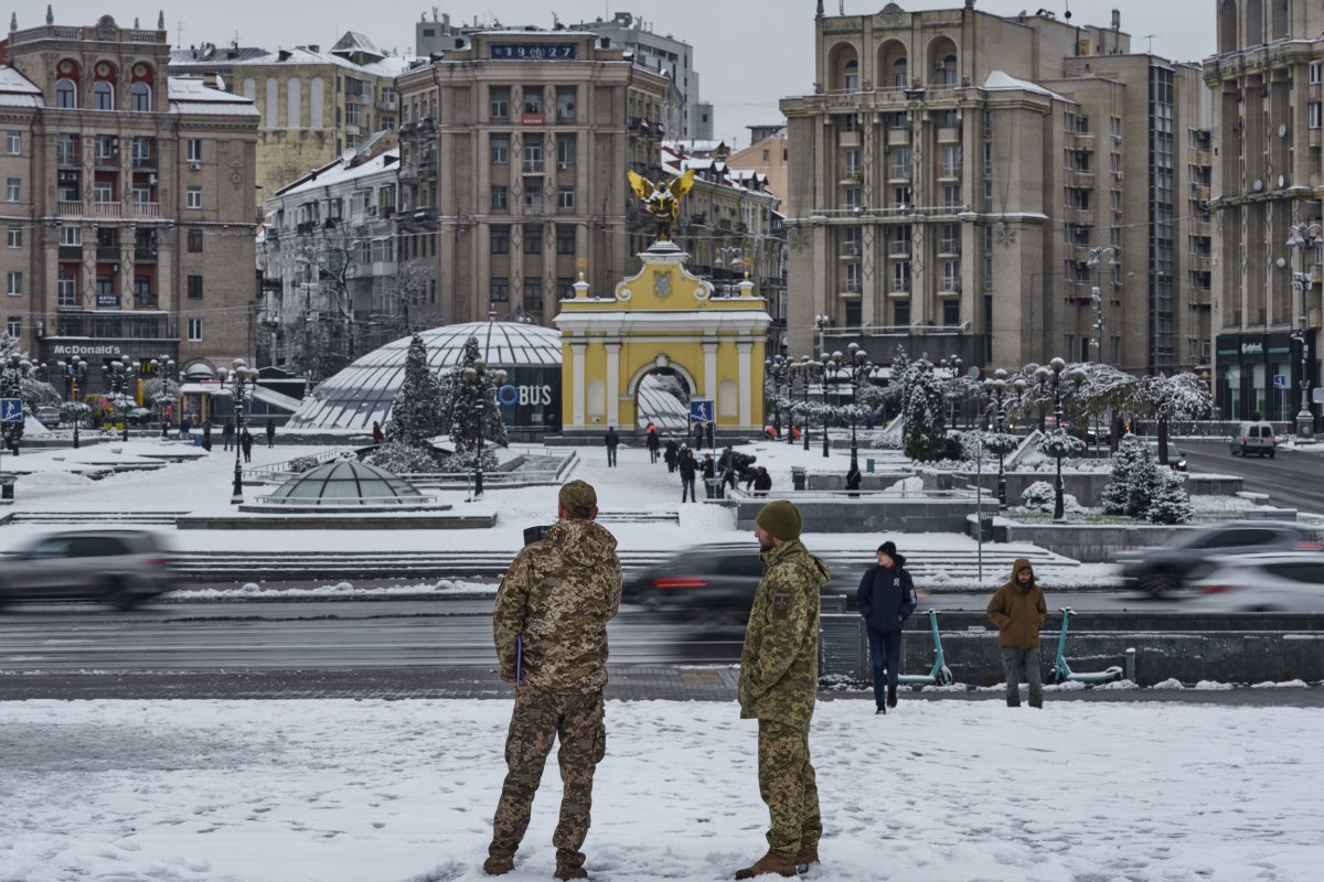 Ukraine soldiers in snowy Maidan square Kyiv