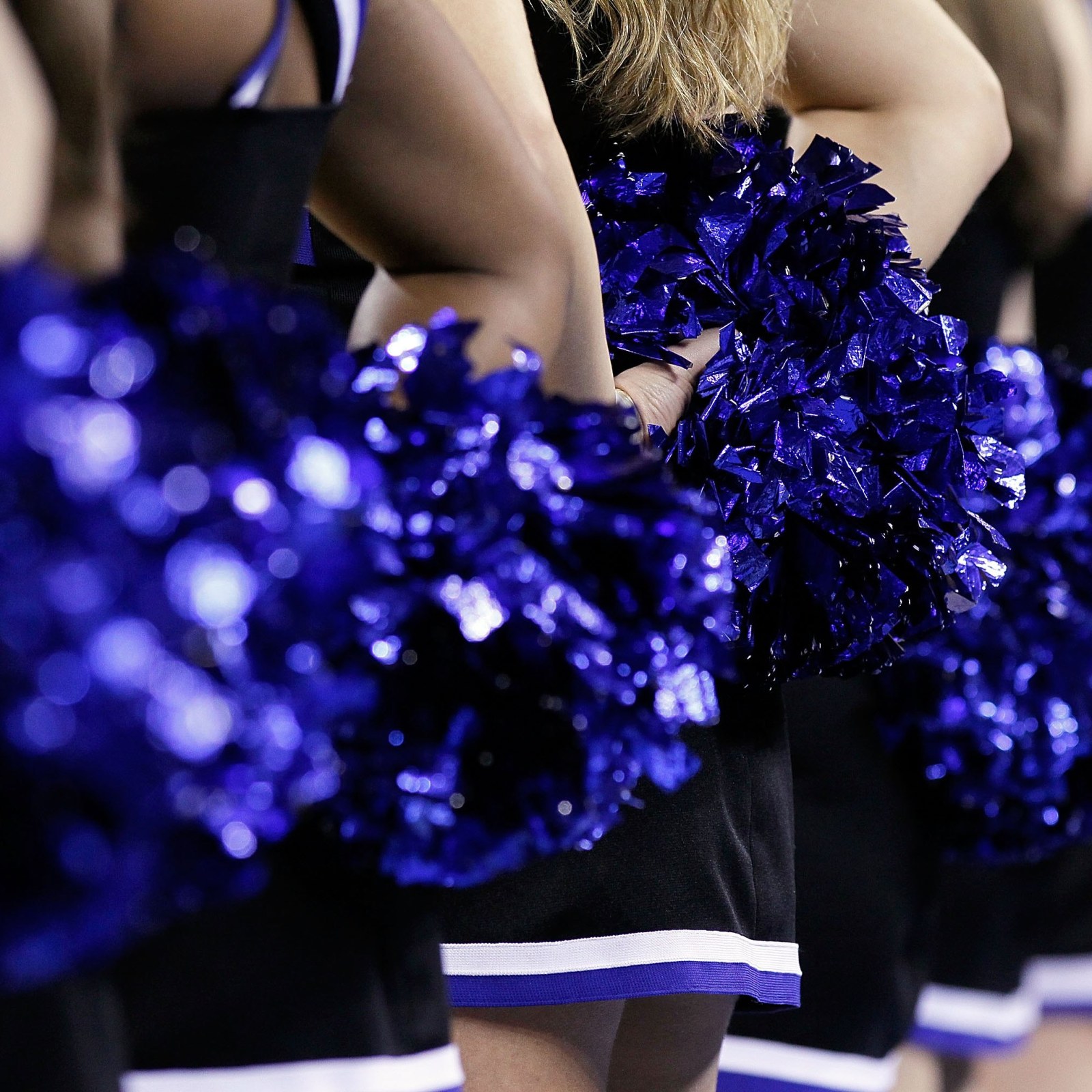 Racism in the cheerleading world and the effects of cheerleading on Black  and African American women's racial identity