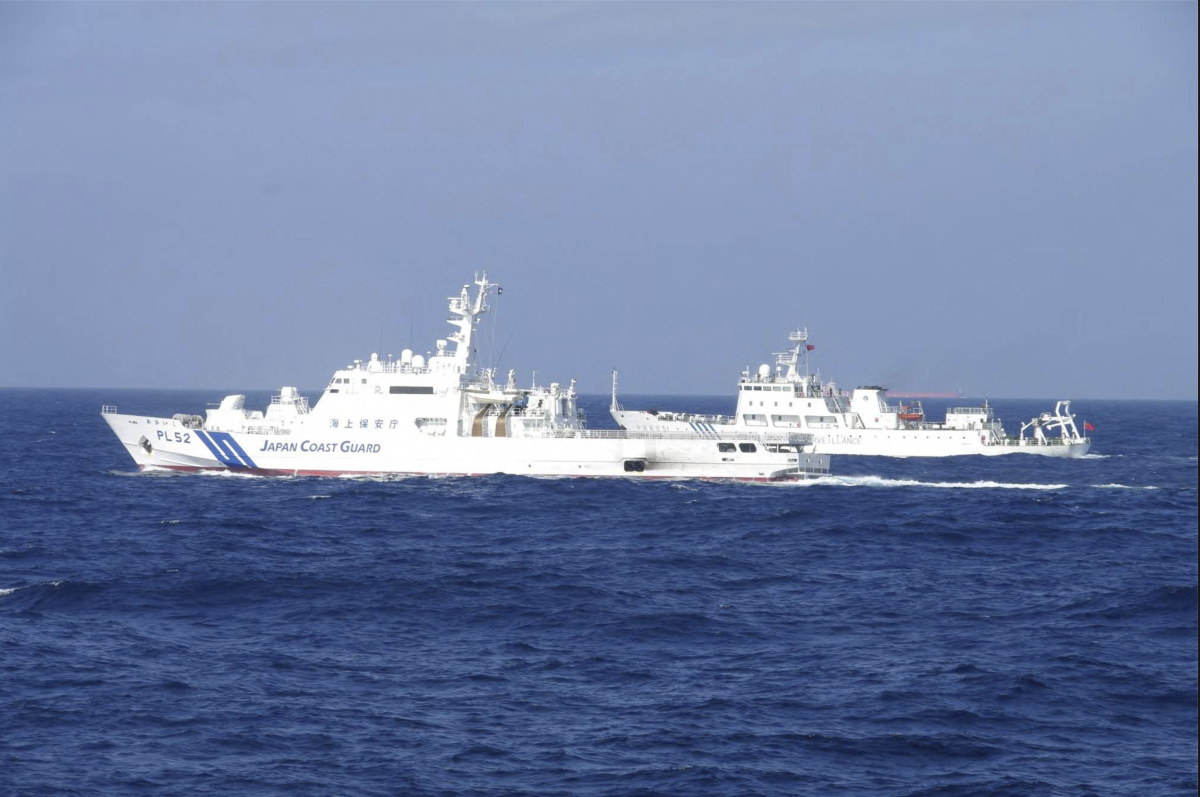 Japanese Coast Guard Sails by Chinese Ship