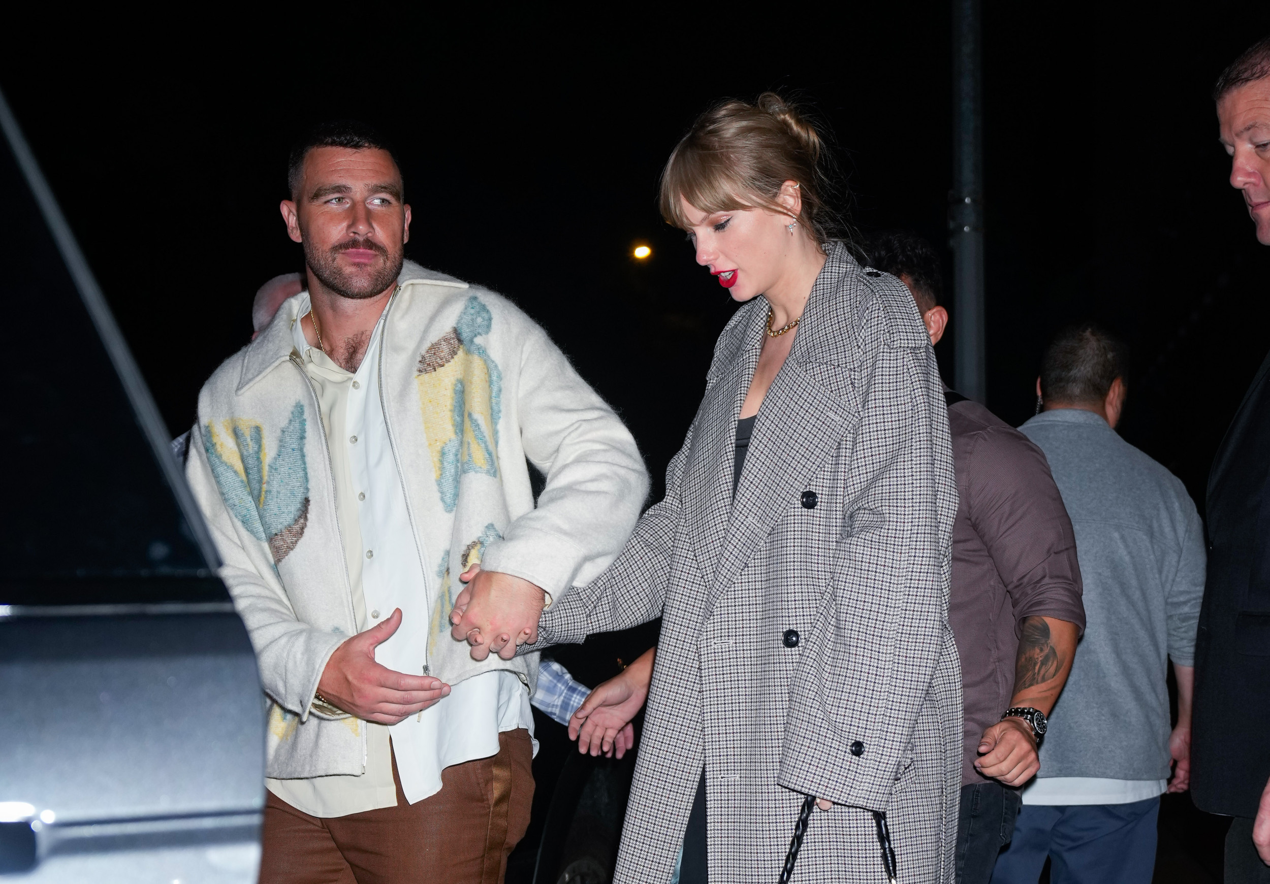 Taylor Swift and Travis Kelce Look Awfully Cozy in Pictures From