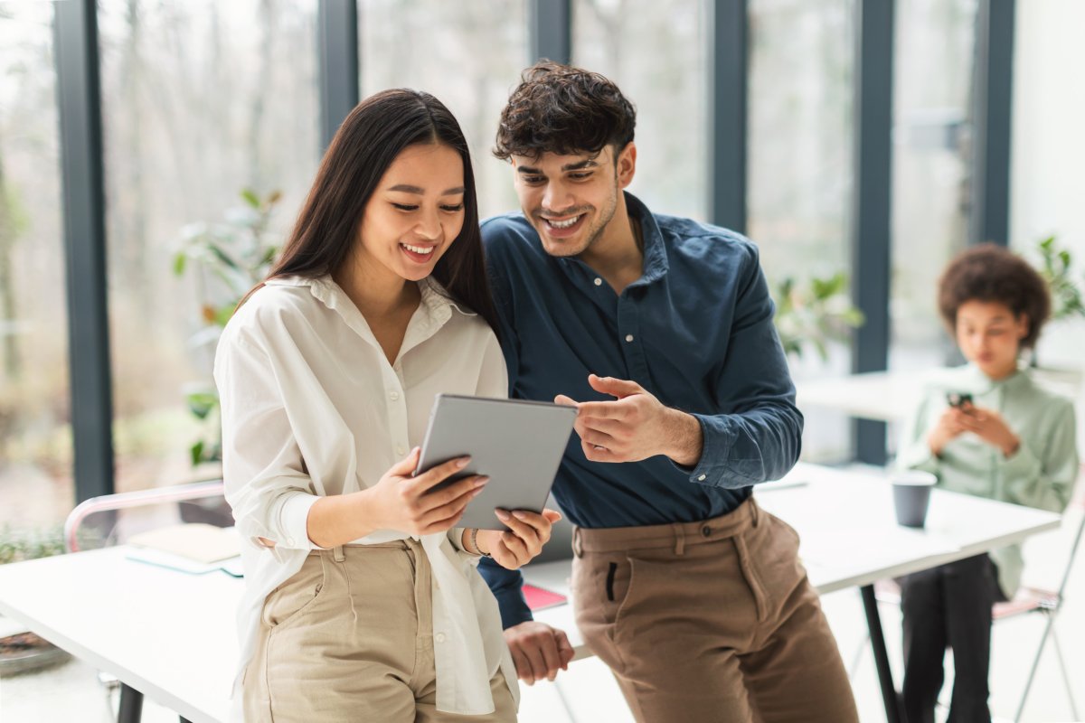 Two office workers talking