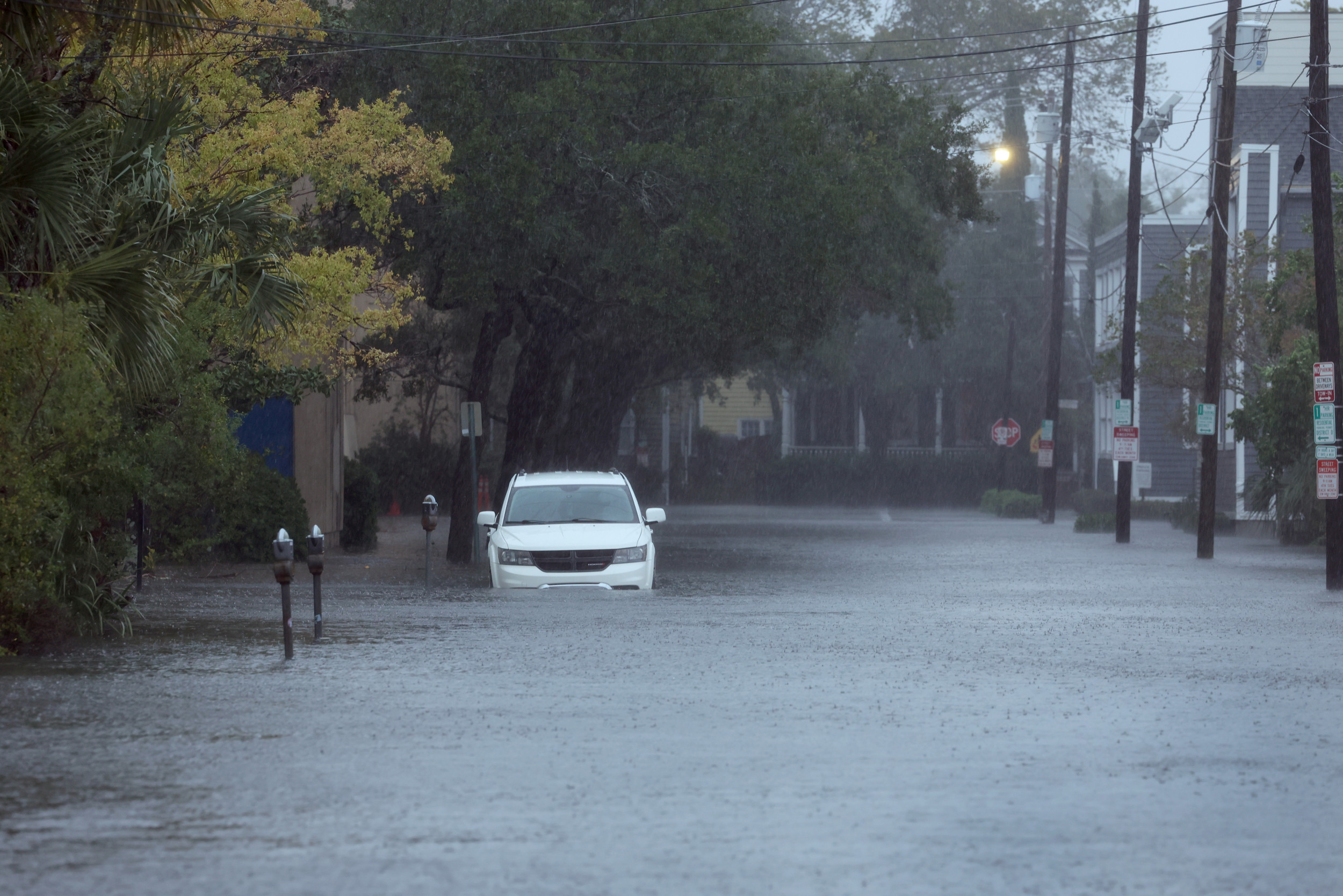 Wild Videos Show Cars Floating in Streets as Severe Weather Hits Carolinas Wild Videos Show Cars Floating in Streets as Severe Weather Hits Carolinas