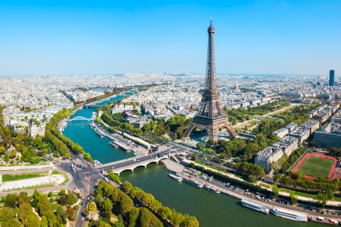 Eiffel Tower overlooking Seine in Paris.
