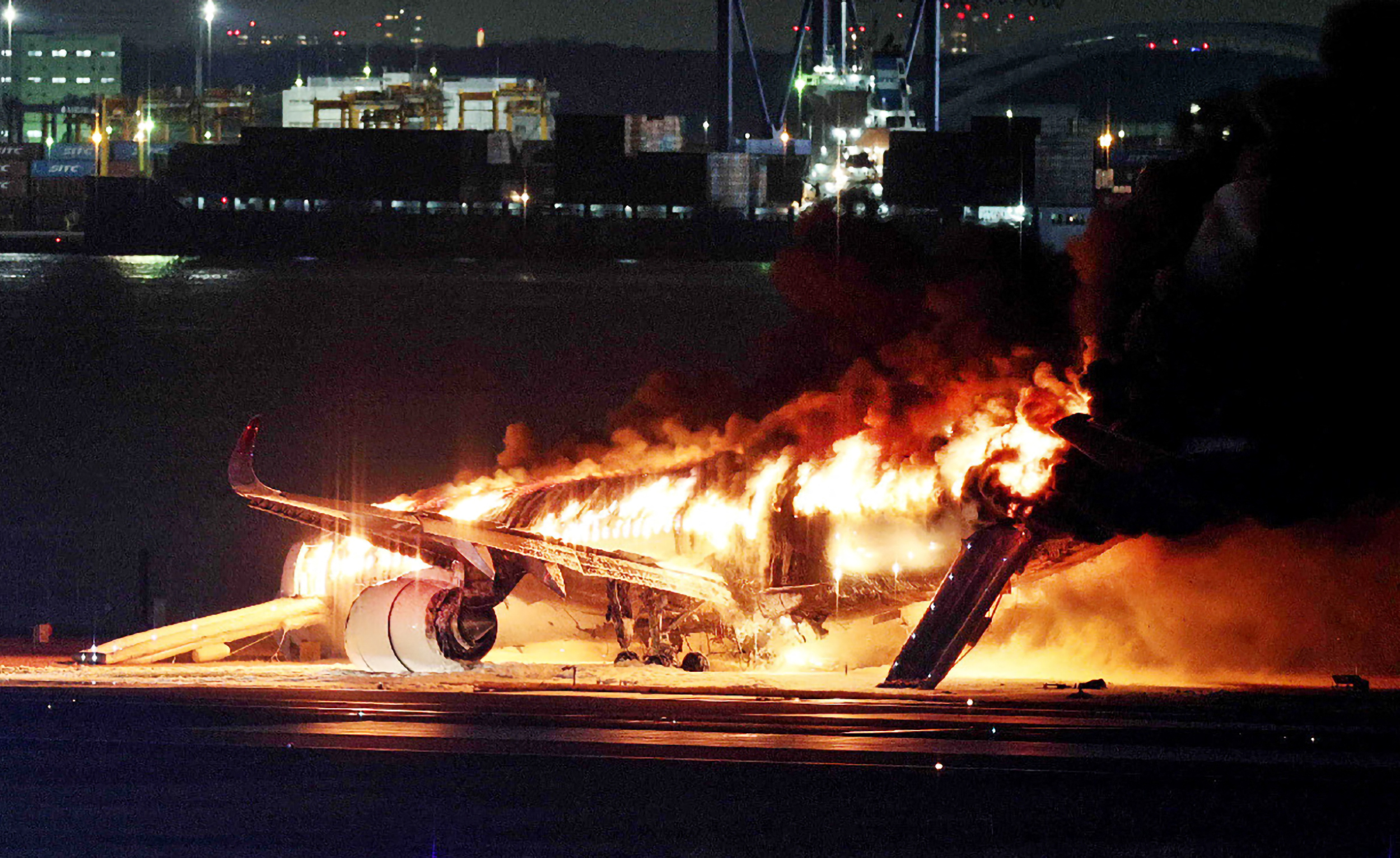 Terrifying Video Inside Japan Airlines Plane Shows Passengers React to Fire