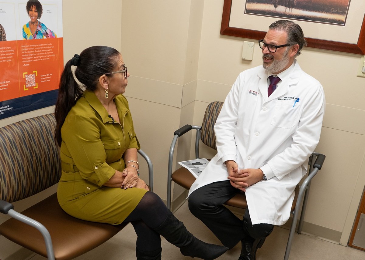 Dr. Teixeira and affected person Maritza Cruz Rivera