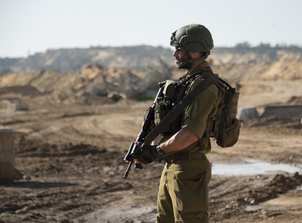  An Israeli soldier exits a tunnel 