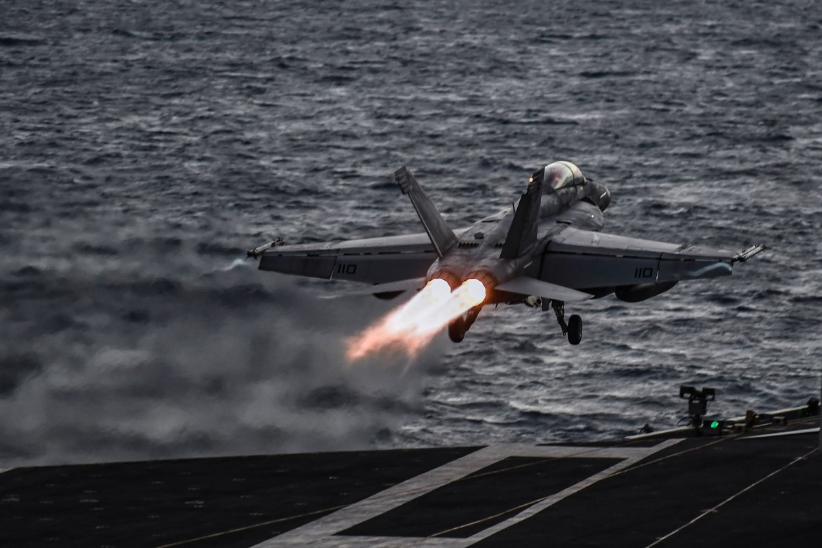 US F/A-18 taking off from aircraft carrier