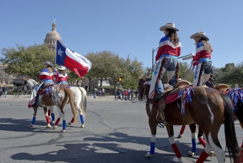 Texans ride up Congress Avenue