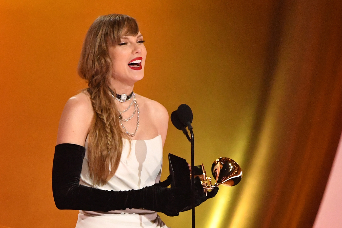 Taylor Swift accepting Grammy award, 2024