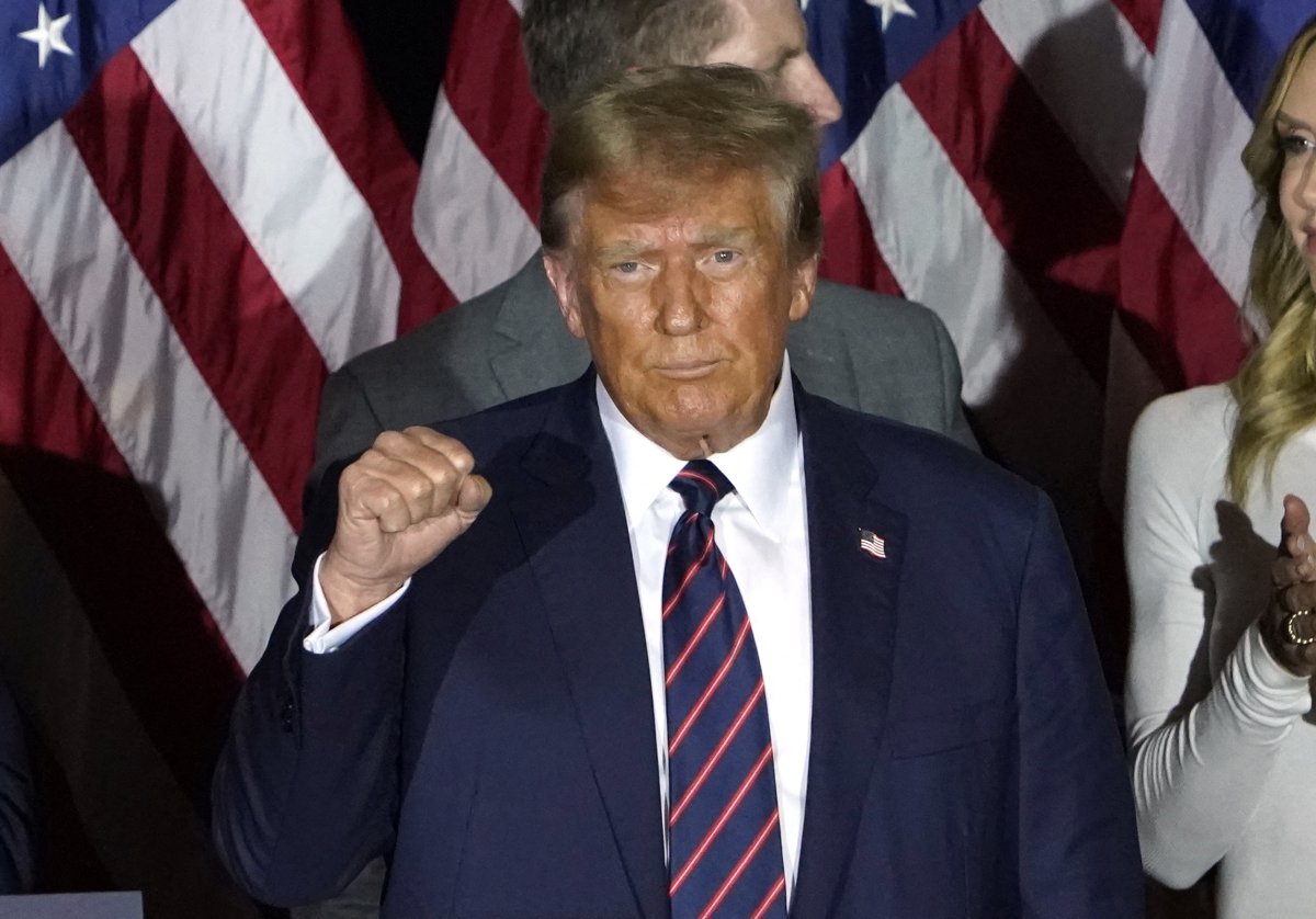 Donald Trump gestures during party