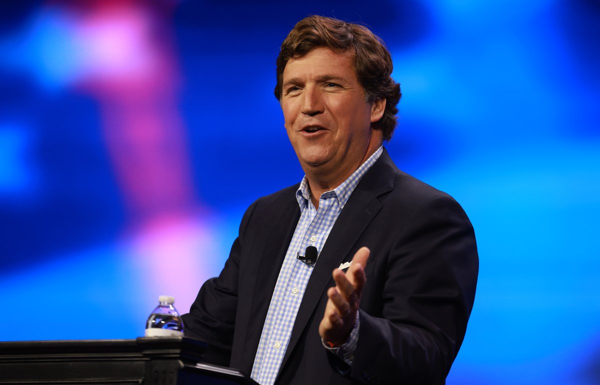 Tucker Carlson during Turning Point Action event