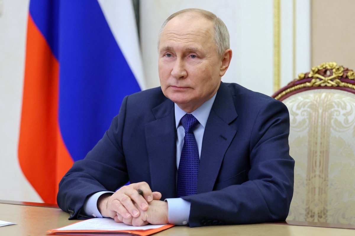 Vladimir Putin Attends a Kremlin Meeting