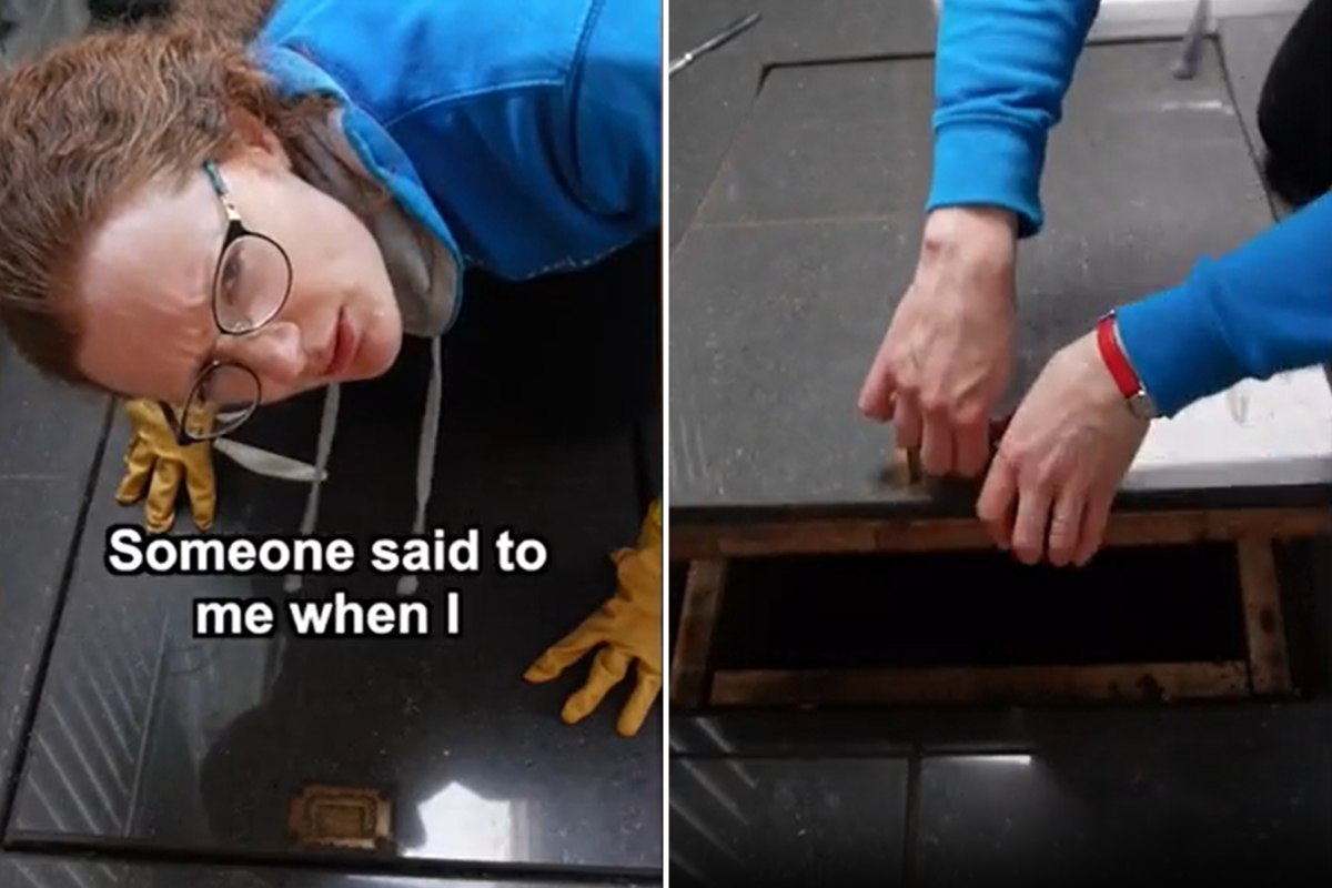 Woman explores trap door