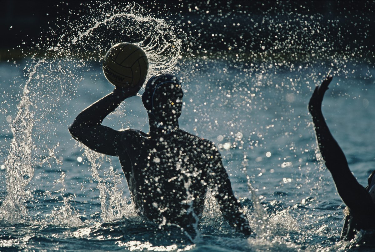 A silhouette water splash of athletes
