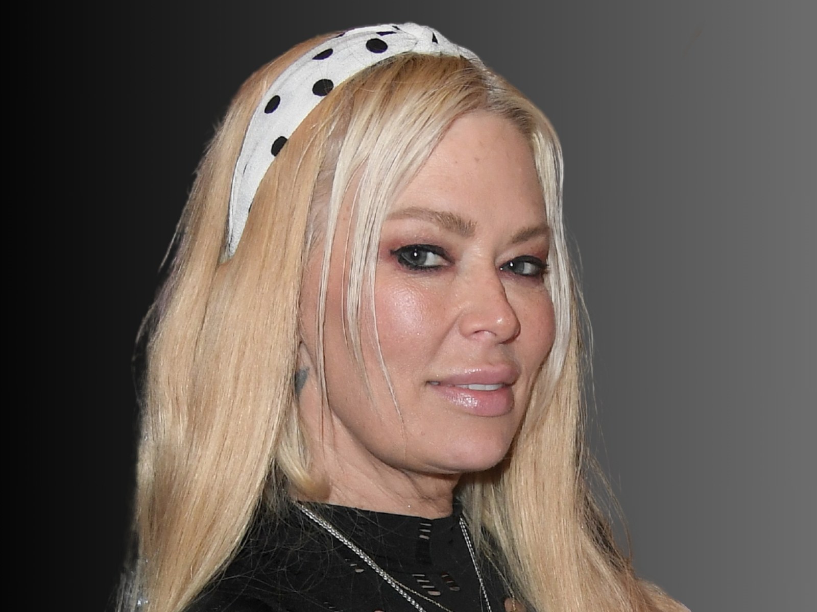 Jenna Jameson giving a health update, showcasing her strong presence